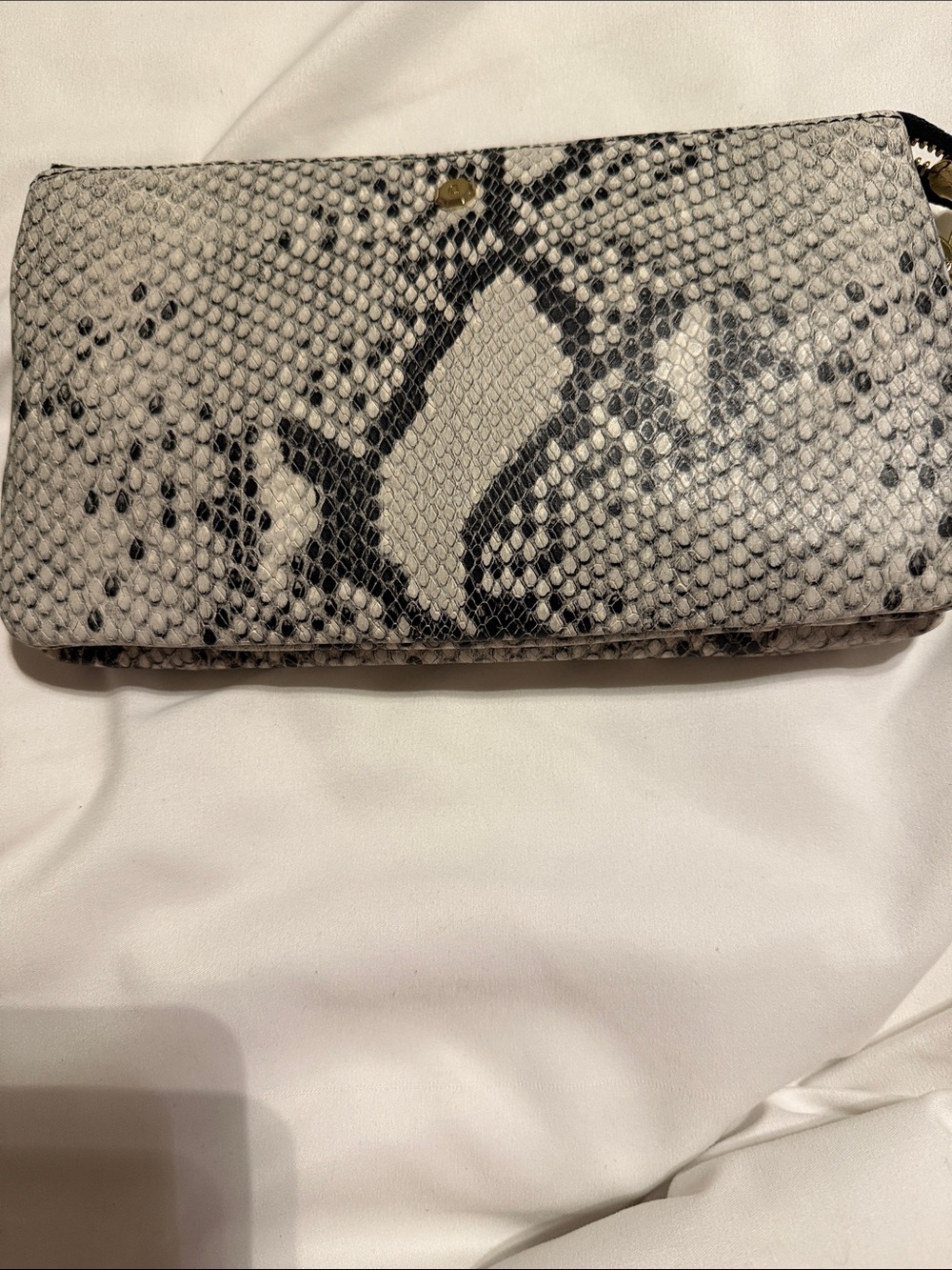 G.I.L.I. (Got It Love It) python-embossed leather clutch